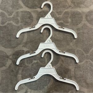 3 “R us” White Hangers